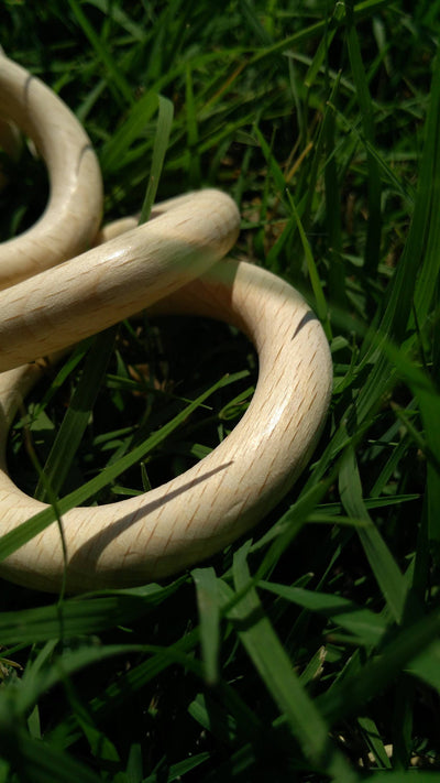 Macrame ring, wooden teethings, wooden wheels rings